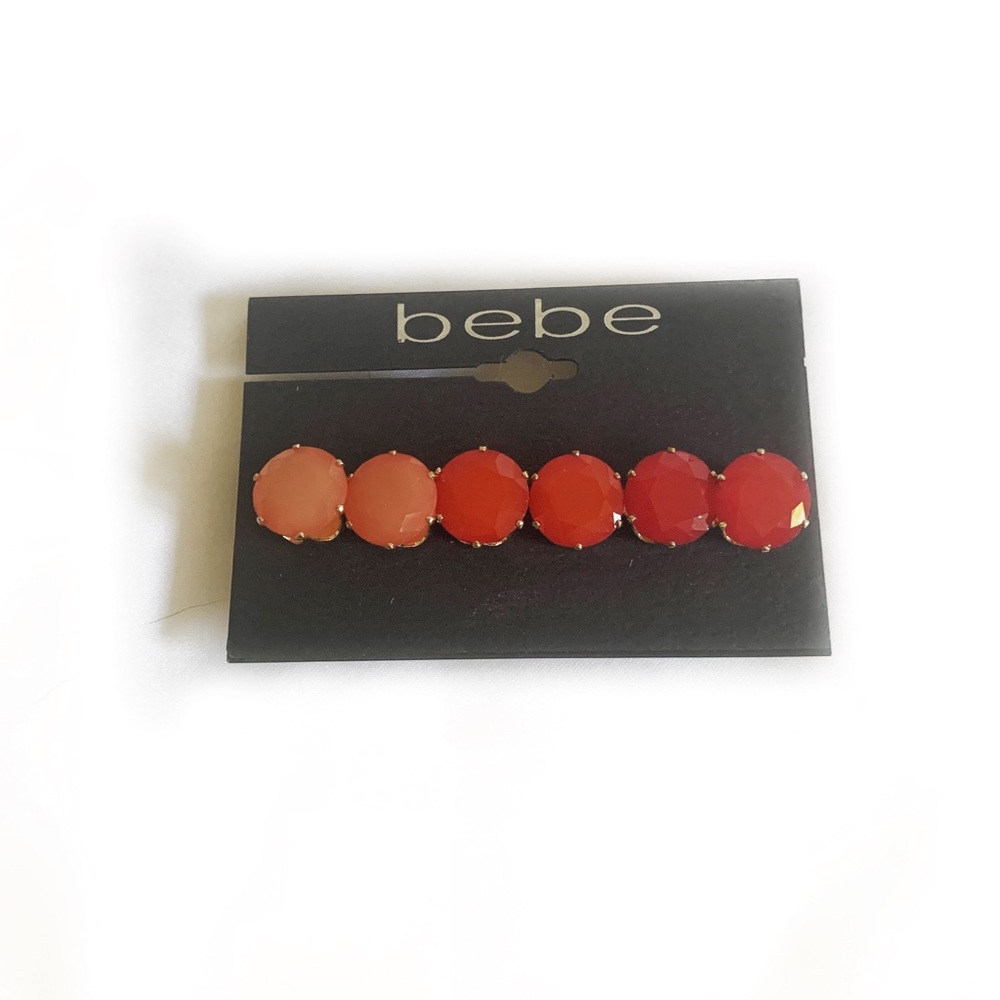 Bebe stud earrings (shades of red/coral) Brand new